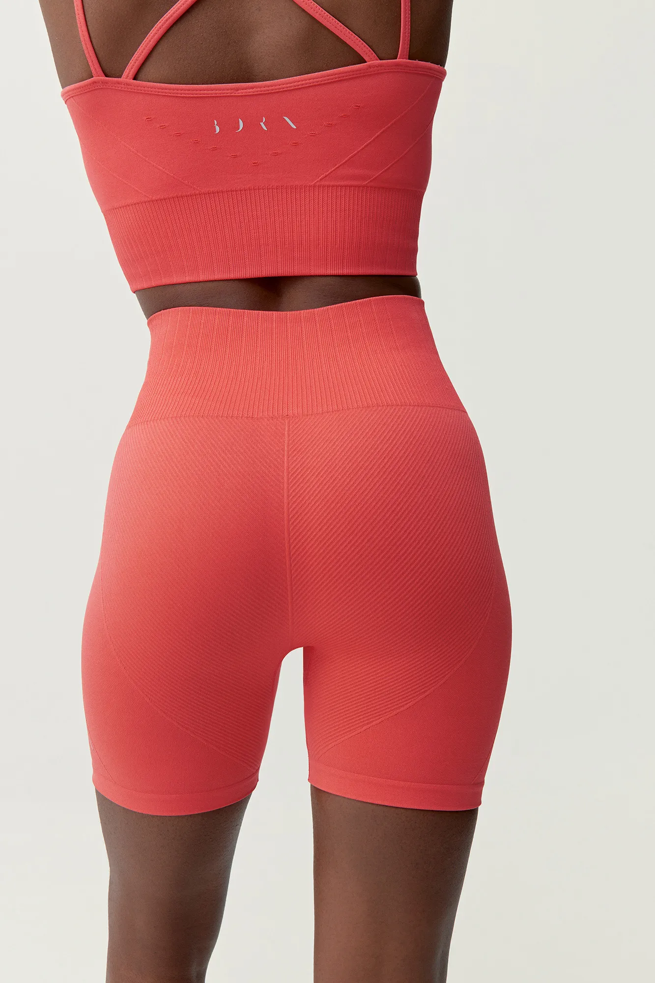 Born Living Yoga Short Dana Coral Bright